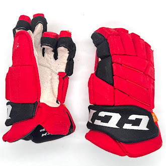 CCM HGJS - Gant d'occasion NHL Pro Stock - Hurricanes de la Caroline (rouge/noir)